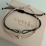 round-CZ-cord-bracelet-sapphire-jewelry